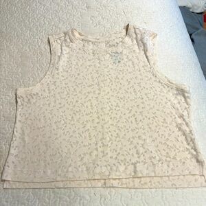 All in Motion Cream Sleeveless crop athletic top